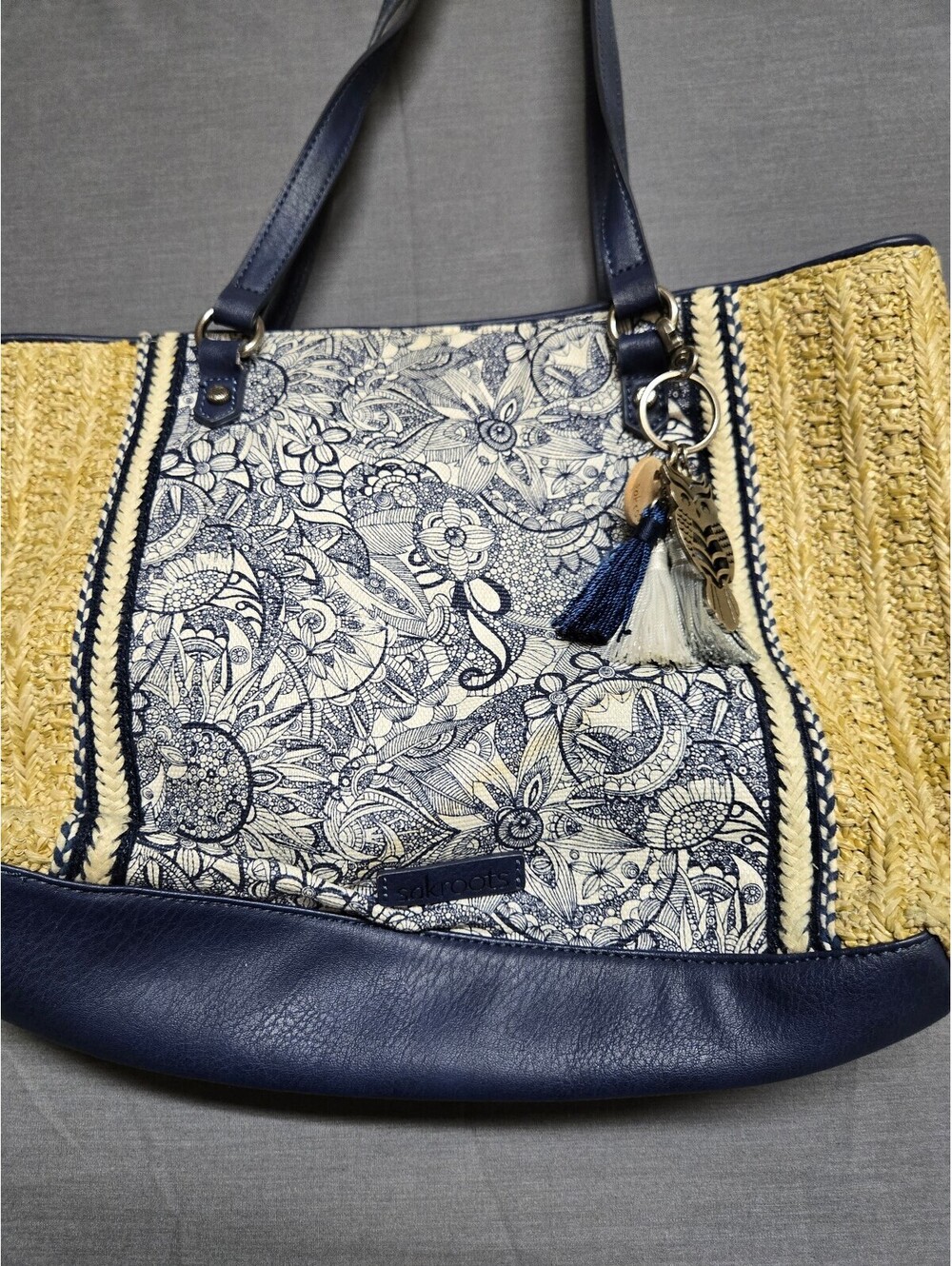 Sakroots straw and navy floral tote bag
